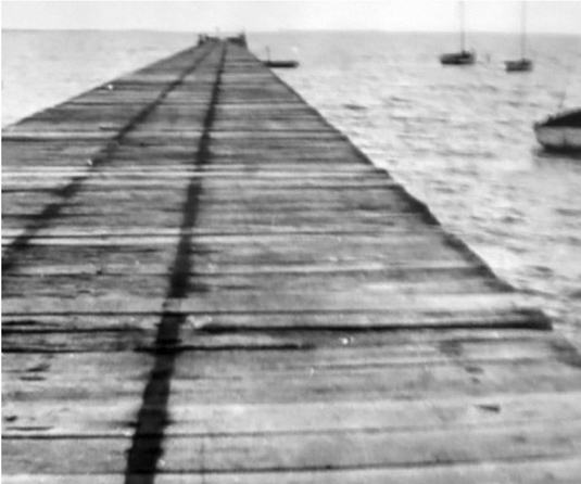 PICTURE CAPTIONS --> The Grantville pier in 1927, stripped of its rails and crane.